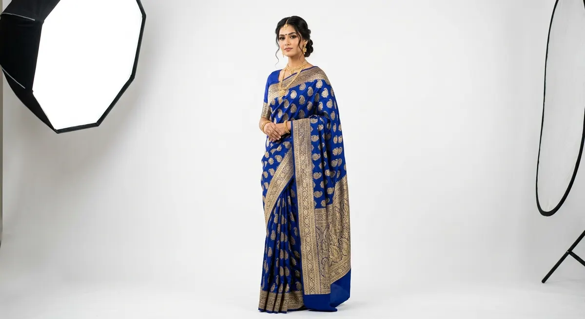ShotRoom AI brand catalog showing North Indian model in Banarasi saree — uniform professional studio lighting and consistent editorial quality