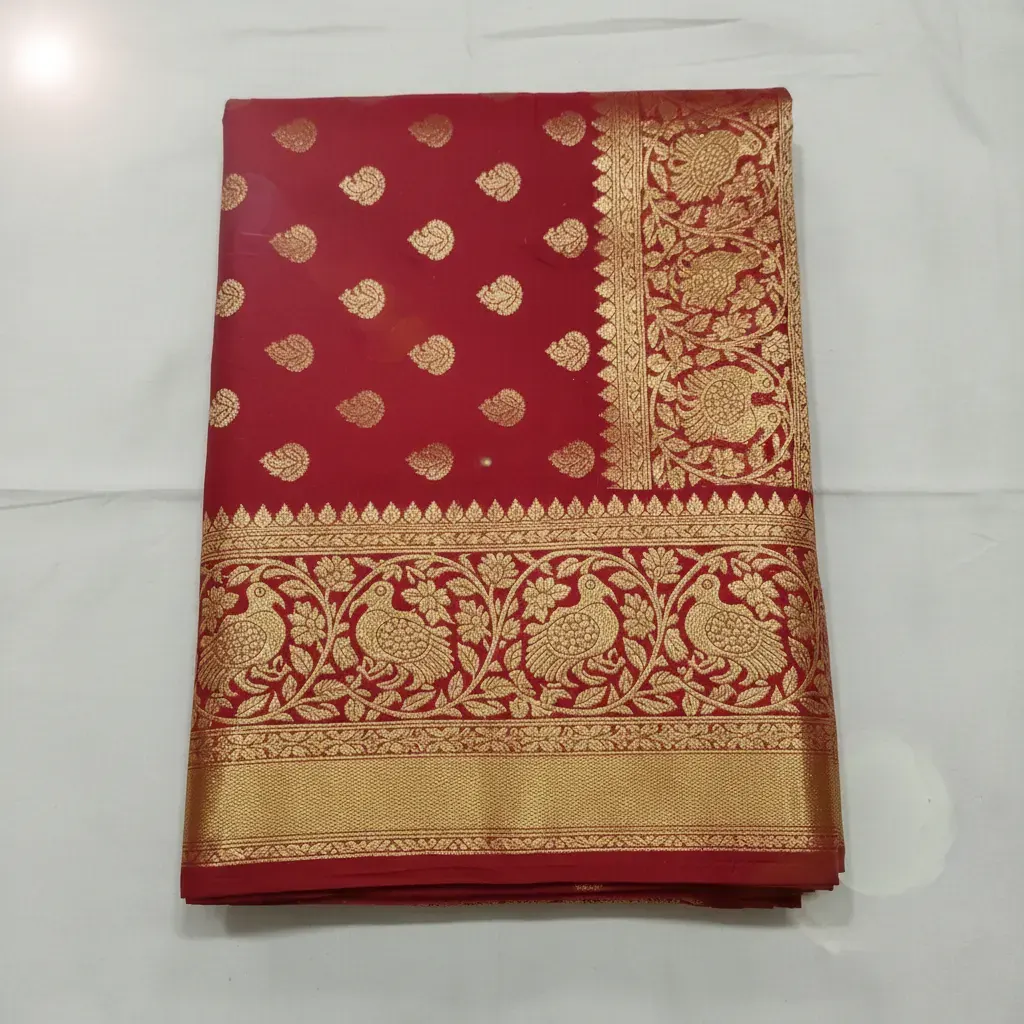 Flat-lay saree on plain background